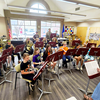 Music teacher Makayla Moen led band performances in the library’s large meeting room.

PHOTOS BY NICOLE WK